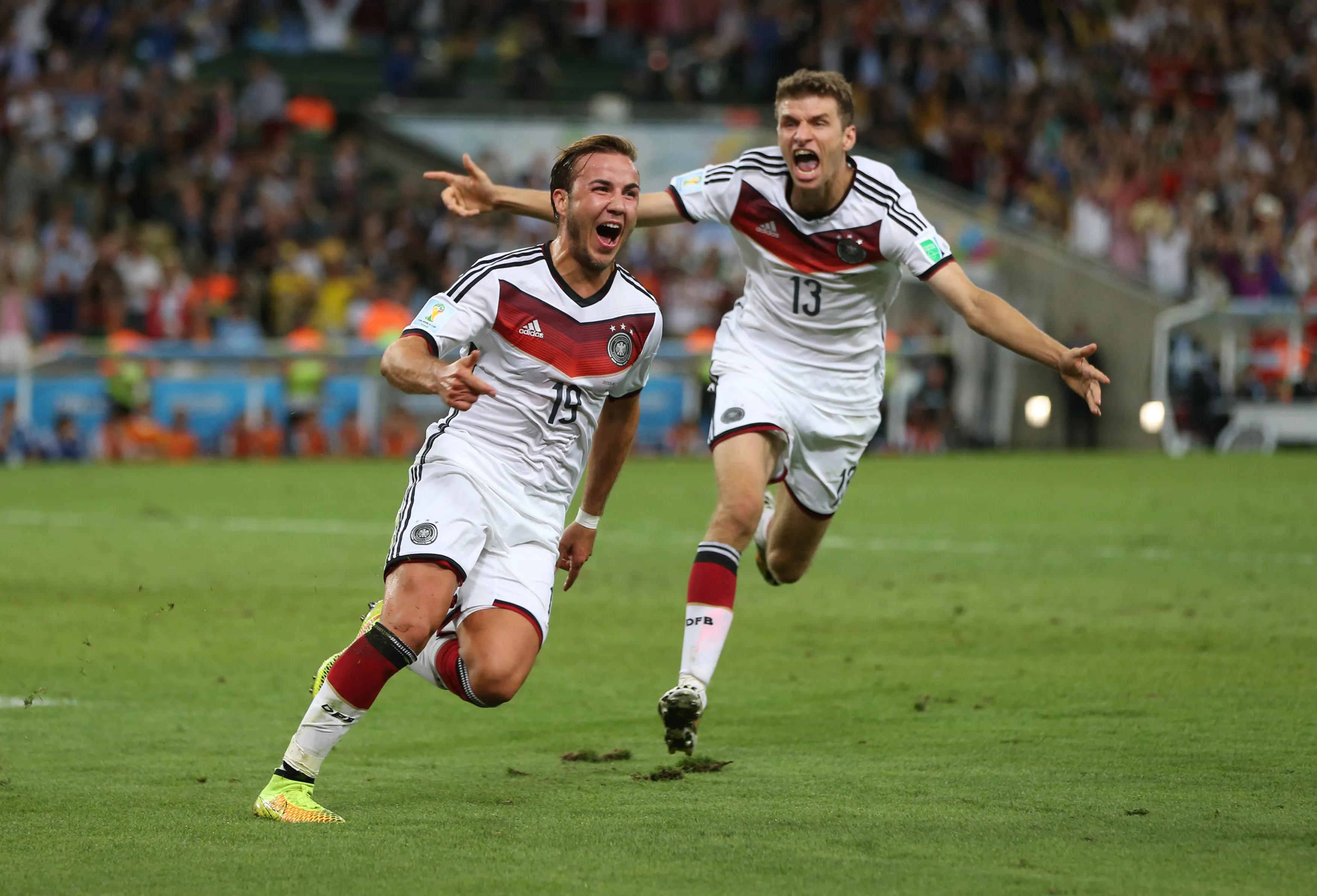 Mario Gotze celebrates scoring the only goal for Germany against Argentina at the Maracana in Rio de Janeiro in the 2014 FIFA World Cup Brazil final RIO DE JANEIRO, BRAZIL - JULY 13: Mario Gotze of Germany celebrates after he scores during the 2014 World Cup final match between Germany and Argentina at The Maracana Stadium on July 13, 2014 in Rio de Janeiro, Brazil. (Photo by Ian MacNicol/Getty Images)