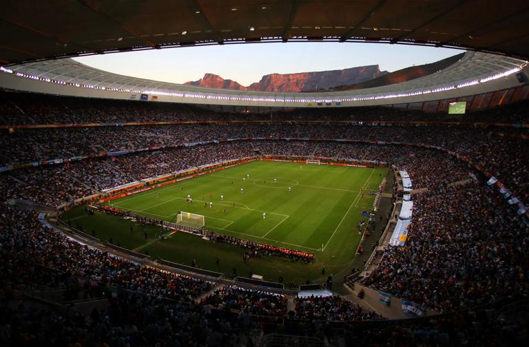 CAPE TOWN, SOUTH AFRICA - JULY 03:  A general view of action showing Table Mountain at sunset in the background during the 2010 FIFA World Cup South Africa Quarter Final match between Argentina and Germany at Green Point Stadium on July 3, 2010 in Cape Town, South Africa.  (Photo by Clive Rose/Getty Images)