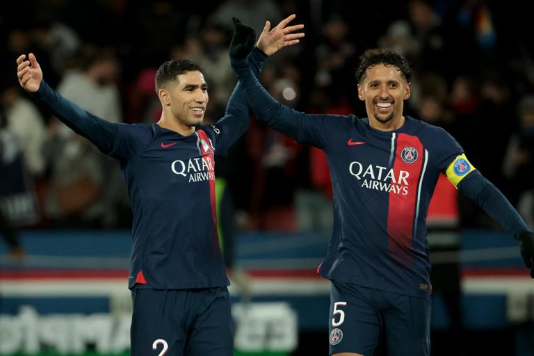 PARIS, FRANCE - JANUARY 3: Achraf Hakimi and Marquinhos of PSG celebrate the victory following the Trophee des Champions (Champions Trophy) between Paris Saint-Germain (PSG) and Toulouse FC (TFC, Tefece) at Parc des Princes stadium on January 3, 2024 in Paris, France. (Photo by Jean Catuffe/Getty Images)