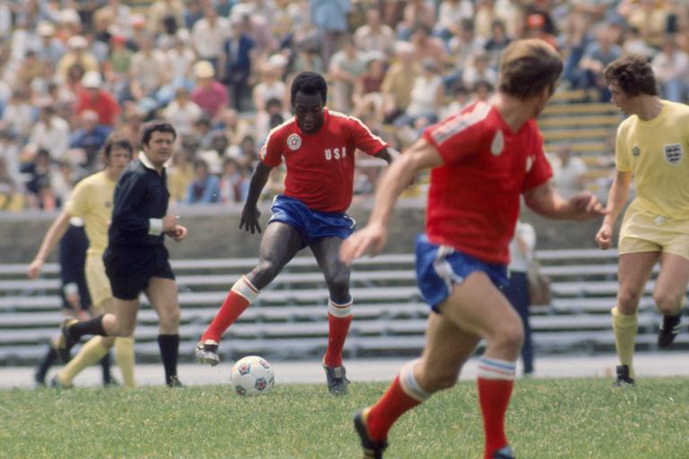 Pele (representing Team America) in action watched by England's Mick Channon (l) and Trevor Cherry (r). The referee is Walter Hungerbuhler from Switzerland. (Photo by Peter Robinson - PA Images via Getty Images)