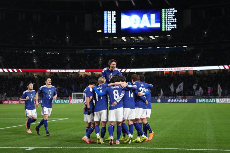 Players of Japan celebrate their first goal during the international friendly match between Japan and Bolivia at National Stadium on November 18, 2025 in Tokyo, Japan.